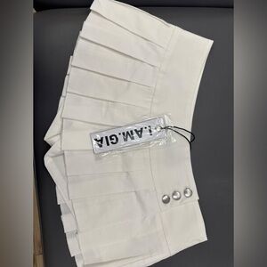 I Am Gia skort 
Has short lining underneath for extra cover 
Mini skirt